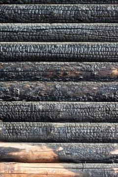 Burned timber wall Stock Photos