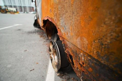 Burned Wheel and Melted Exploded Rubber Tire inside Van Shell Fotos Stock