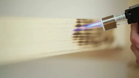 Burned woods - making burned pattern with blowtorch Stock Footage 42028365