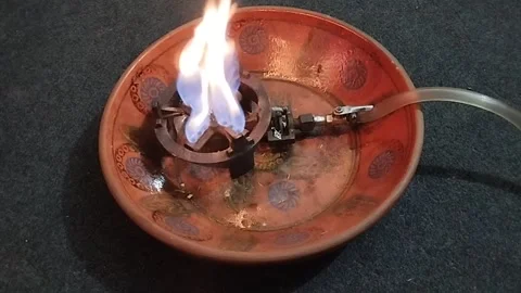 A Burner in a Mud Dish on grey carpet 動画素材 264971973