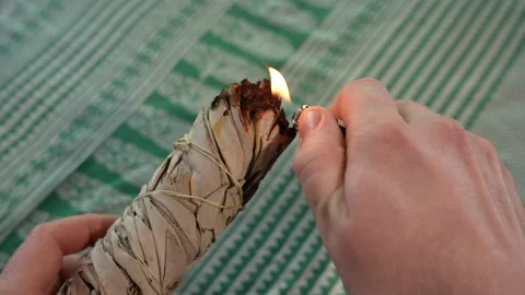 Burnign bundle of thick sage leaves - Medium Shot - 4K 120fps Stock Footage 206164772