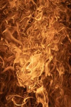 Burning abstract background. Flames abstract. Fire flames with intense glow Stock Photos