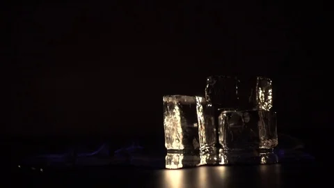 Burning alcohol with around ice cubes 스톡 동영상 70278819