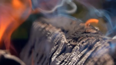 Burning and smoking firewoods. Extreme closeup slow motion shot Vídeos de archivo 116894053