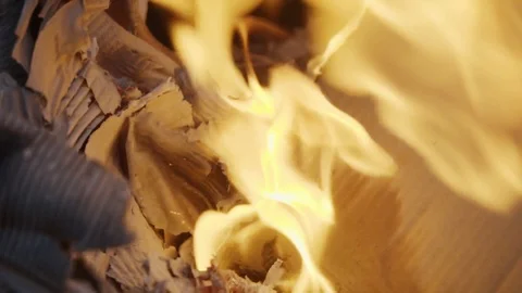 Burning ashes, burning paper in the fire of the fireplace Stock Footage 122346302