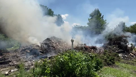 Burning ashes of a home Stock Footage 339801828