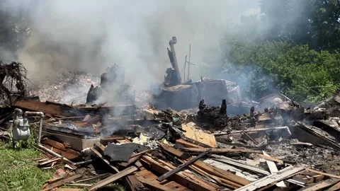 Burning ashes of a home Stock Footage 339801831