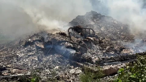 Burning ashes of a smouldering home Stock Footage 339801830
