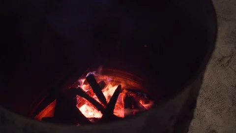 Burning Barrel Inside Fire Wood Stock-Footage 119056413