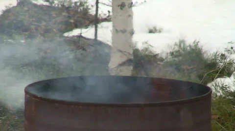 Burning in a barrel one Stock Footage 77338