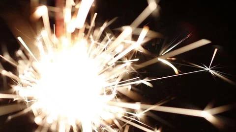 Burning bengal fire close-up on a black background Stock Footage 82166789