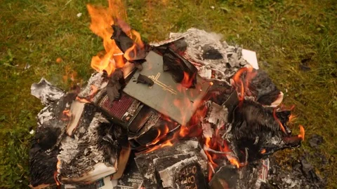 Burning Bible in a fire Stock Footage 80000220