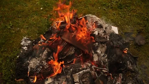 Burning Bible in a fire Stock Footage 80000671