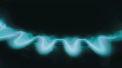 Burning Blue Flame of Gas on a Kitchen Stove in Macro Stock Footage 235938551