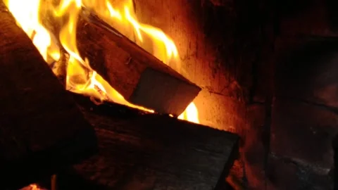 Burning boards in the fireplace at night Stock Footage 220556934