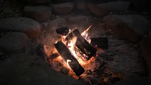 Burning bonfire to a circle of stones Stock Footage 103203136