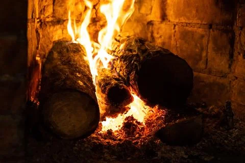 Burning bonfire logs on fire close up, fireplace with wood Stock Photos
