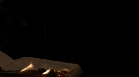 Burning book on black background dolly shot Stock Footage 60021782
