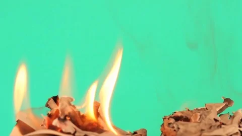 Burning book on green screen smooth zoom Stock Footage 76994927