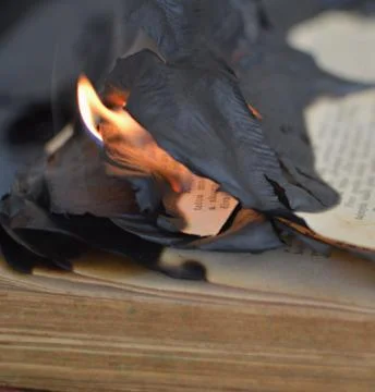 Burning book Stock Photos