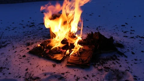 Burning book in the snow. Video stock 104689672