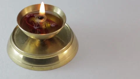 Burning brass lamp isolated view on a white background Stock Footage 292157763