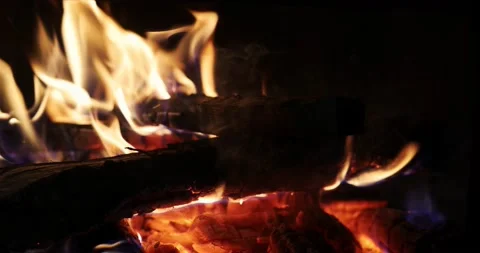 Burning bright fire in a fire in the dark.	 Video stock 168181136