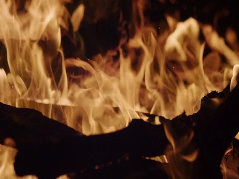 Burning Camp Fire, The bonfire is lit at night. Close Up, Slow Motion Stock Footage 70711191