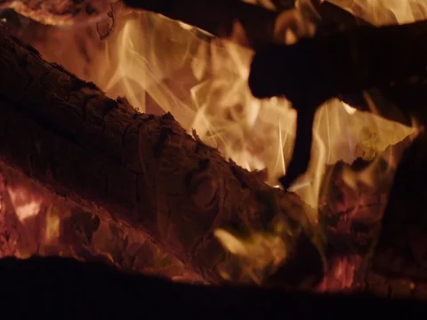 Burning Camp Fire, The bonfire is lit at night. Close Up, Slow Motion Stock Footage 70711725