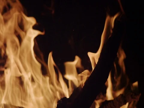 Burning Camp Fire, The bonfire is lit at night. Close Up, Slow Motion Stock Footage 70712059