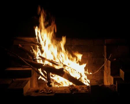 Burning Campfire on a dark night Stock Photos