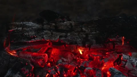 Burning campfire embers with glowing coals and crackling audio close up Stock Footage 345121994