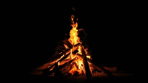 Burning campfire isolated on black background. Fire flames night bonfire sp.. Stock Footage 233494923
