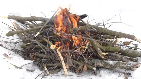 Burning Campfire on Snow Stock Footage 102407236