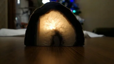 Burning candle in an agate candlestick Stock Footage 123773950