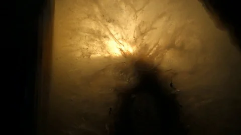 Burning candle in an agate candlestick Video stock 123774473