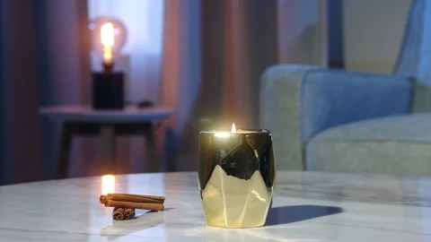 Burning candle and cinnamon Stock-Footage 223880647