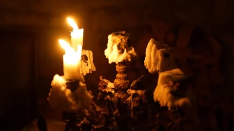 Burning candle on a antique Candlestick Stock Footage 85692343