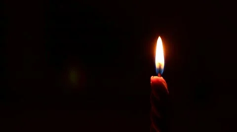 Burning candle with black background Stock Footage 42694087