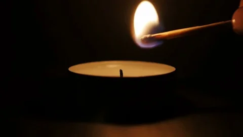 Burning candle black background Stock Footage 72234382