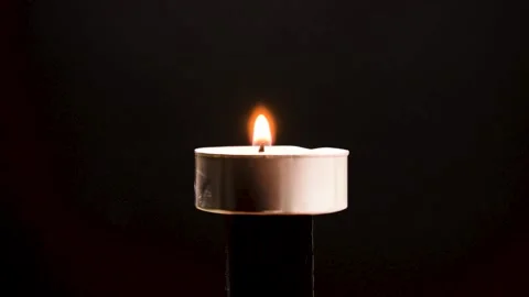 Burning candle on black background Stock Footage 146851769