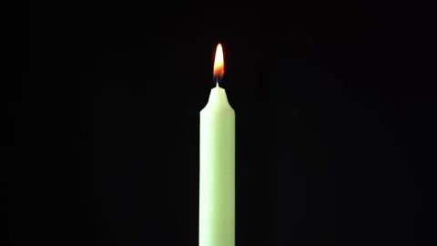 Burning candle on a black background Stock Footage 272221056