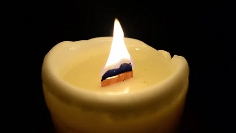Burning a candle. The candle burns in the dark. Stock Footage 201666271