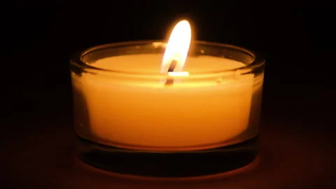 Burning candle close up on a dark background. Stock Footage 147038265