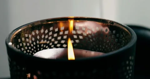 Burning candle in close up Stock Footage 246492836