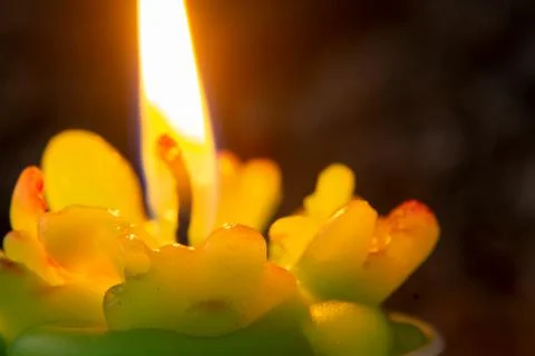 Burning candle close-up Stock Photos