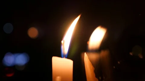 Burning Candle on a Dark Background. Stock Footage 88603821