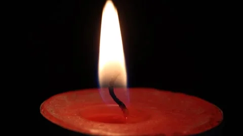 Burning candle in the dark background Video stock 165610428