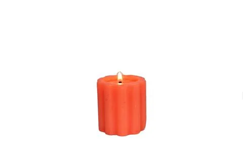 Burning candle in dark background Stock Photos