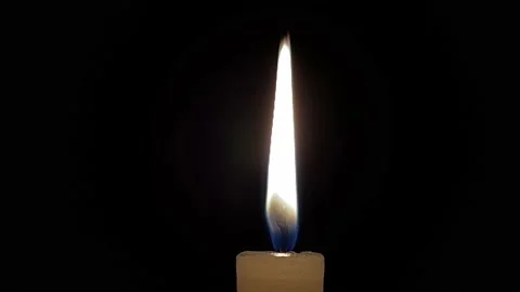 Burning candle on a dark background. Romantic evening. Stock-Footage 196183369